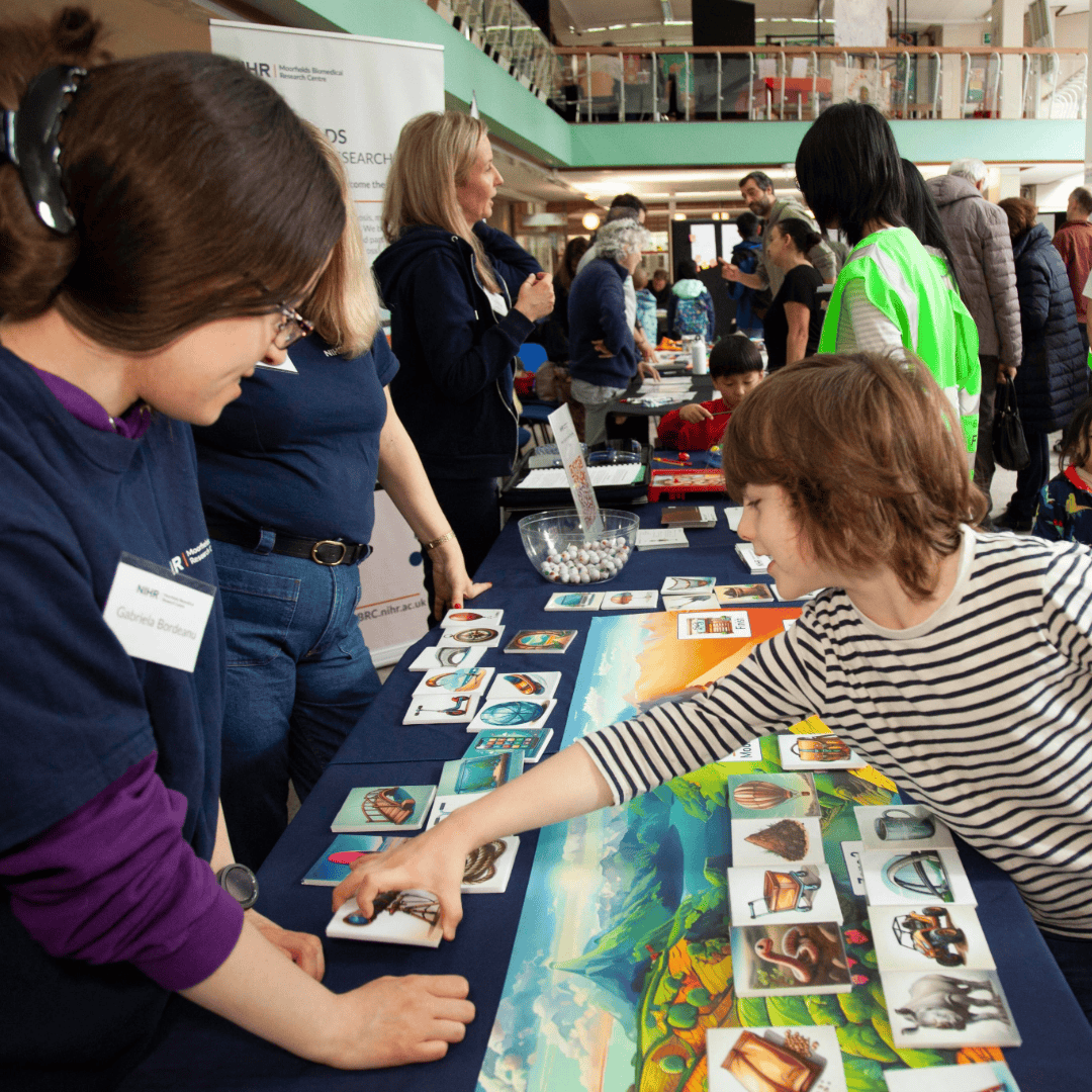 Researchers and Children play the No One Left behind game at Bloomsbury Festival