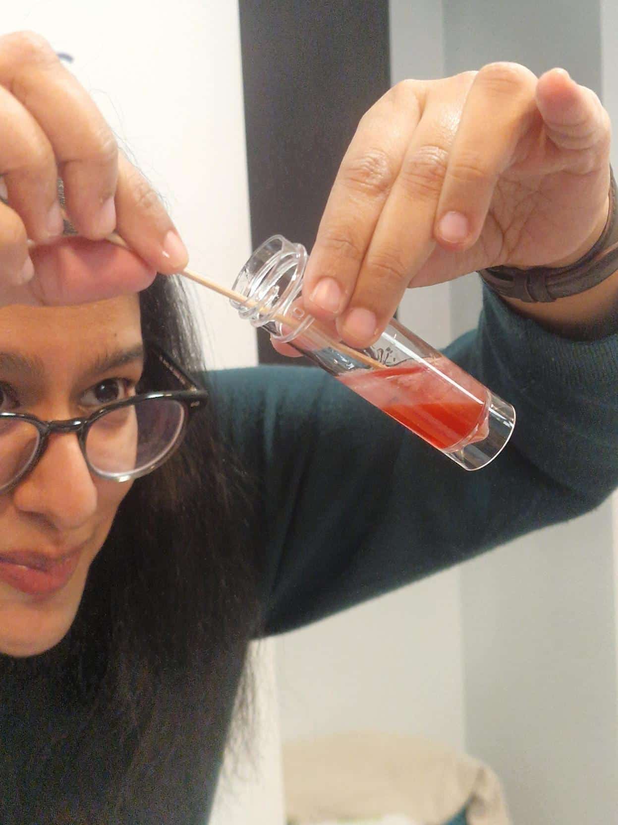 Research Fellow Nihar Bhattacharyya, showing How you can extract DNA from strawberry flesh.